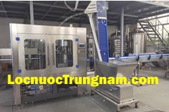 Máy chiết rót va đóng nắp chai tự động bảng giá mới 2022